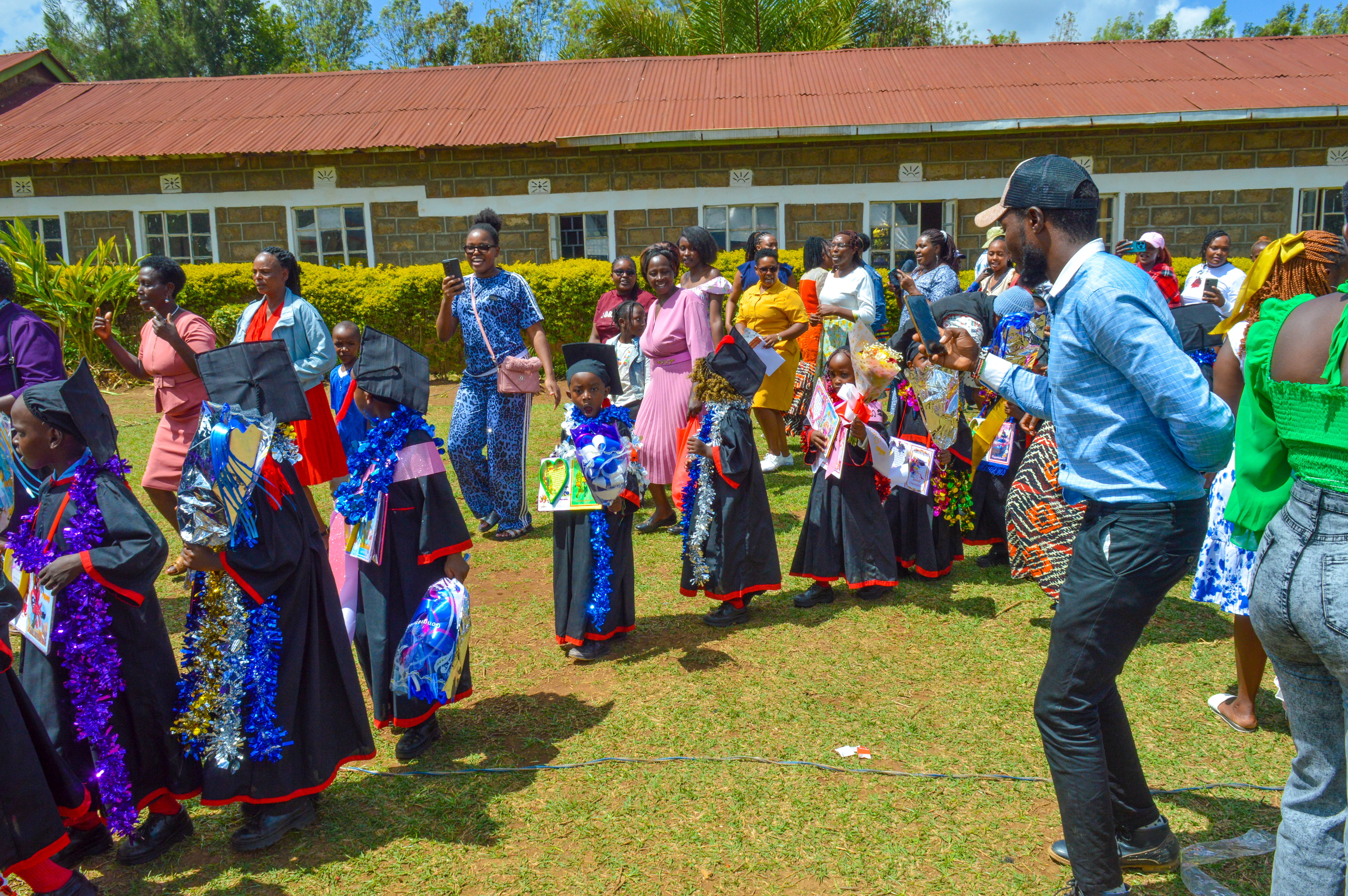 Families celebrating with graduating children